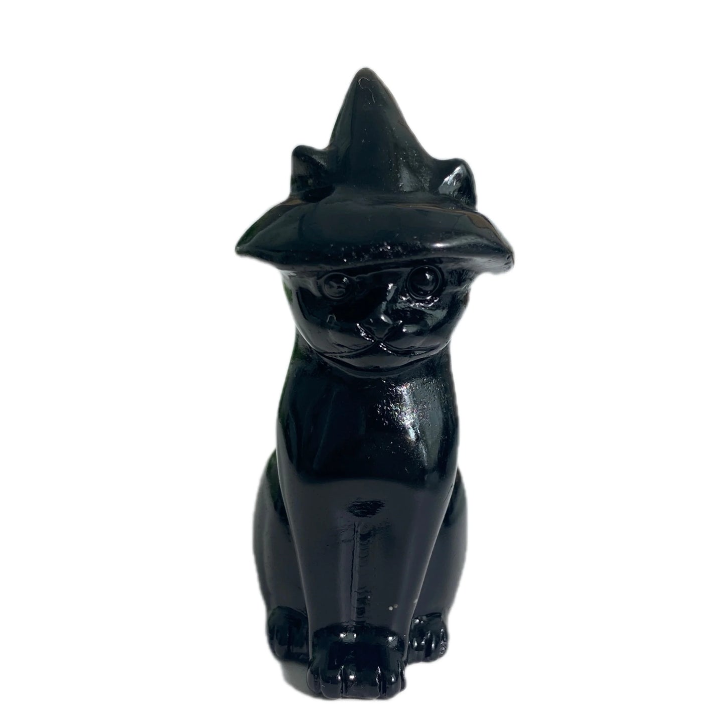 Black cat figurine with a hat on a white background