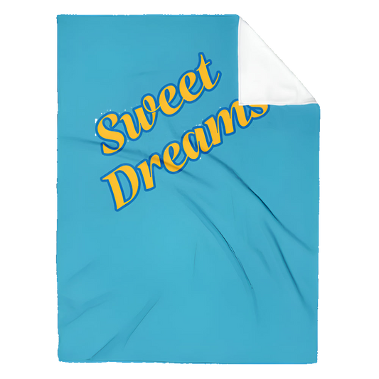 Blue blanket with 'Sweet Dreams' text in yellow on a white background