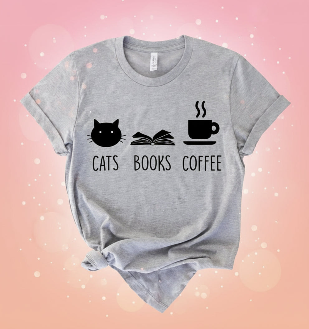 Gray t-shirt with 'Cats Books Coffee' graphic on a white background