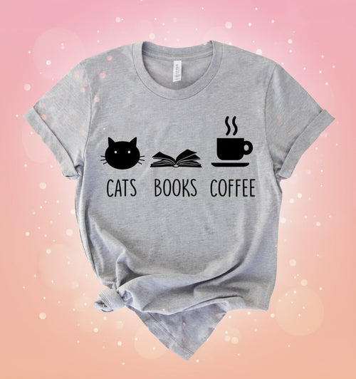 Gray t-shirt with 'Cats Books Coffee' graphic on a white background