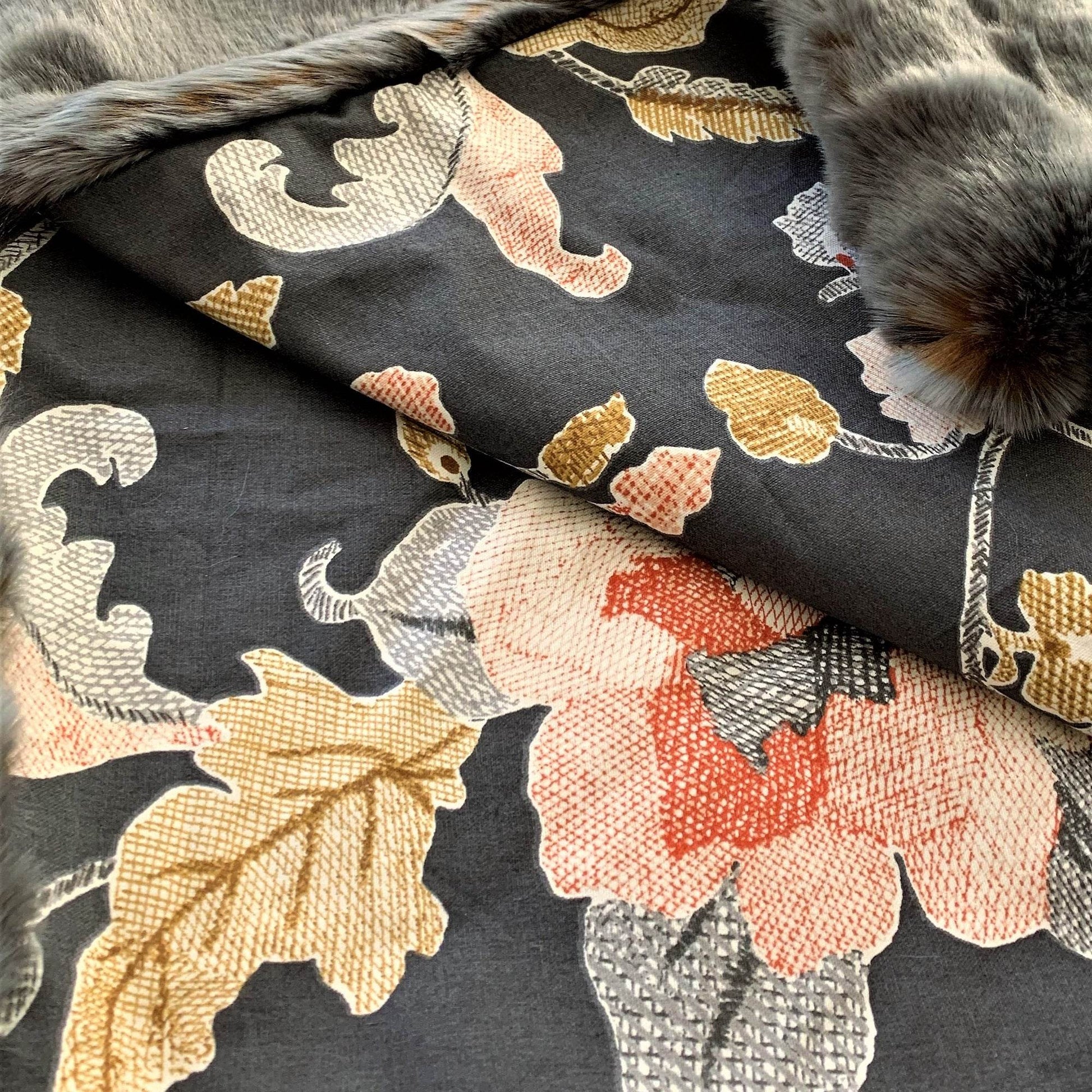 Floral and leaf patterned fabric with fur trim