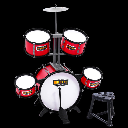 Children's drum set with red drums and white bass drum on a white background
