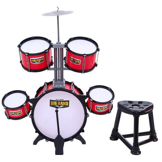 Children's drum set with red drums and white bass drum on a white background