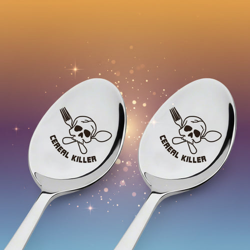 Two silver spoons with 'Cereal Killer' design on a white background