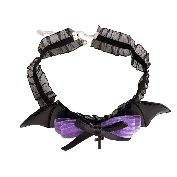 Black lace choker with a purple bow and small gold accessory on a white background