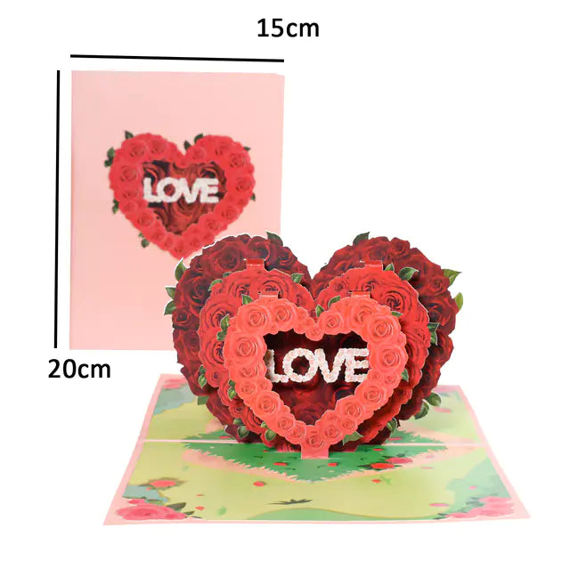 Heart-shaped 3D pop-up card with roses and 'LOVE' text, shown with measurements on a white background.