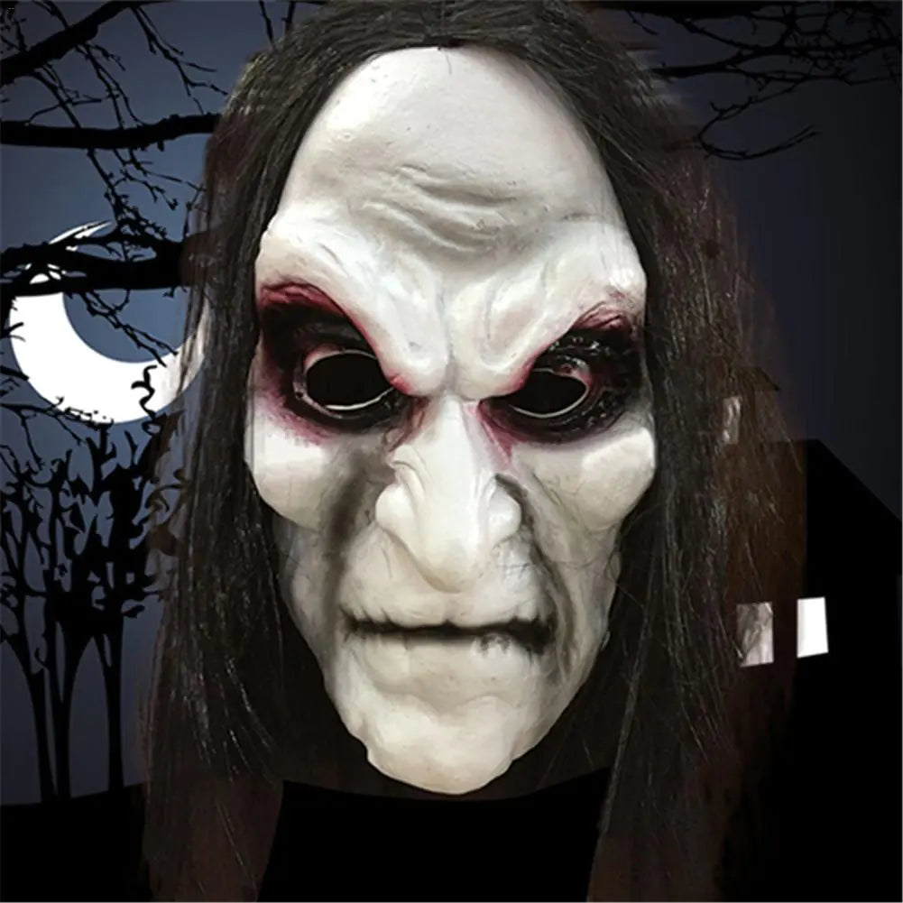 Person wearing a horror-themed mask with dark background