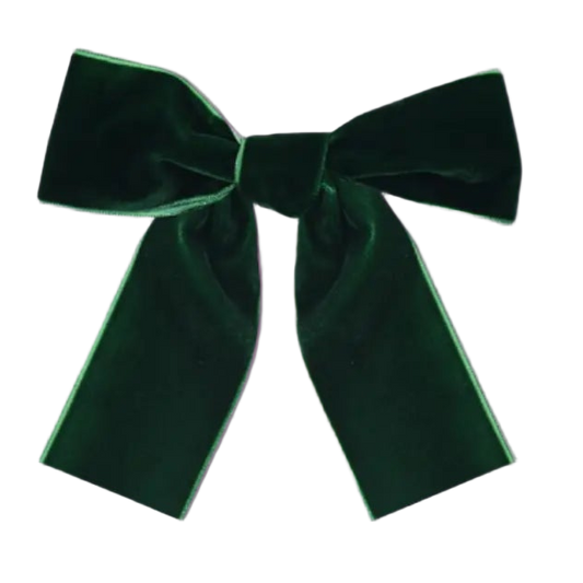 Green velvet ribbon with a bow on a white background