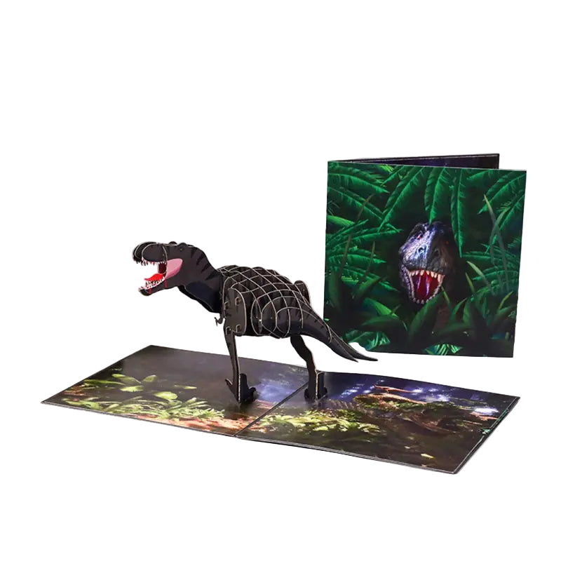 Dinosaur model and pop-up book with jungle scene on a white background