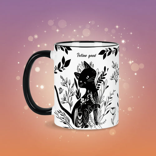 White mug with black cat illustration and floral design, featuring the text 'Feline good'.