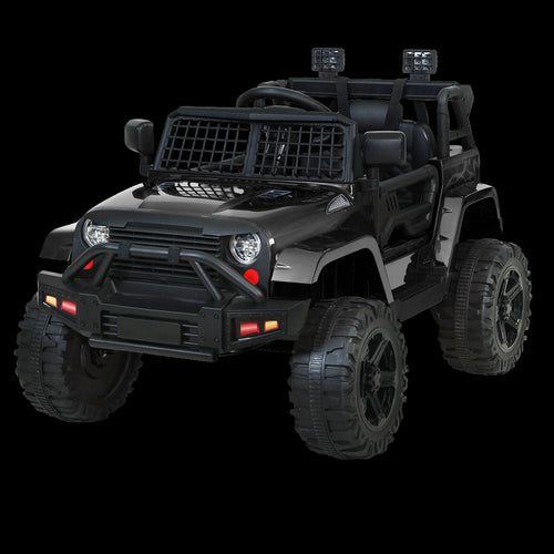 Black toy off-road vehicle with large wheels on a white background