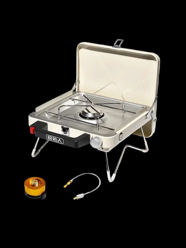 Outdoor camping stove with accessories on a white background