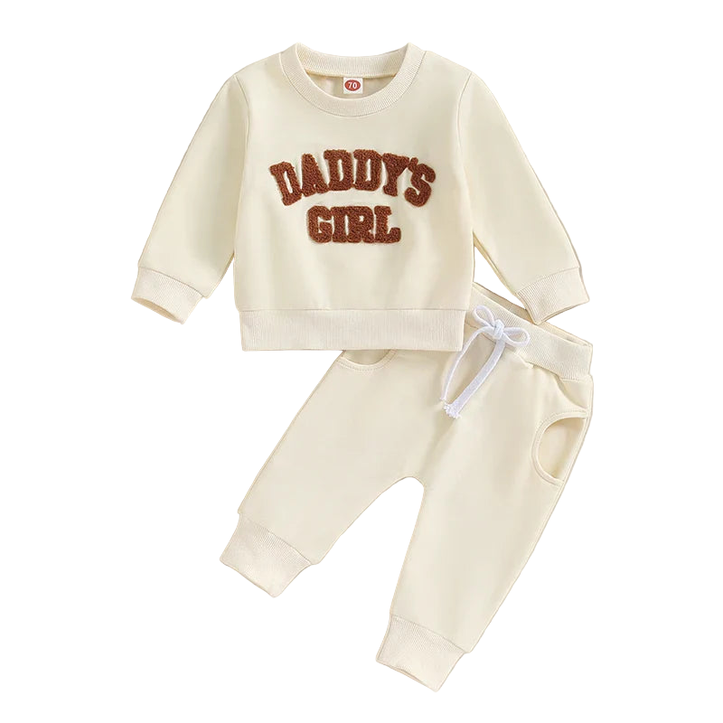 Children's outfit with 'Daddy's Girl' sweatshirt and pants on a light background