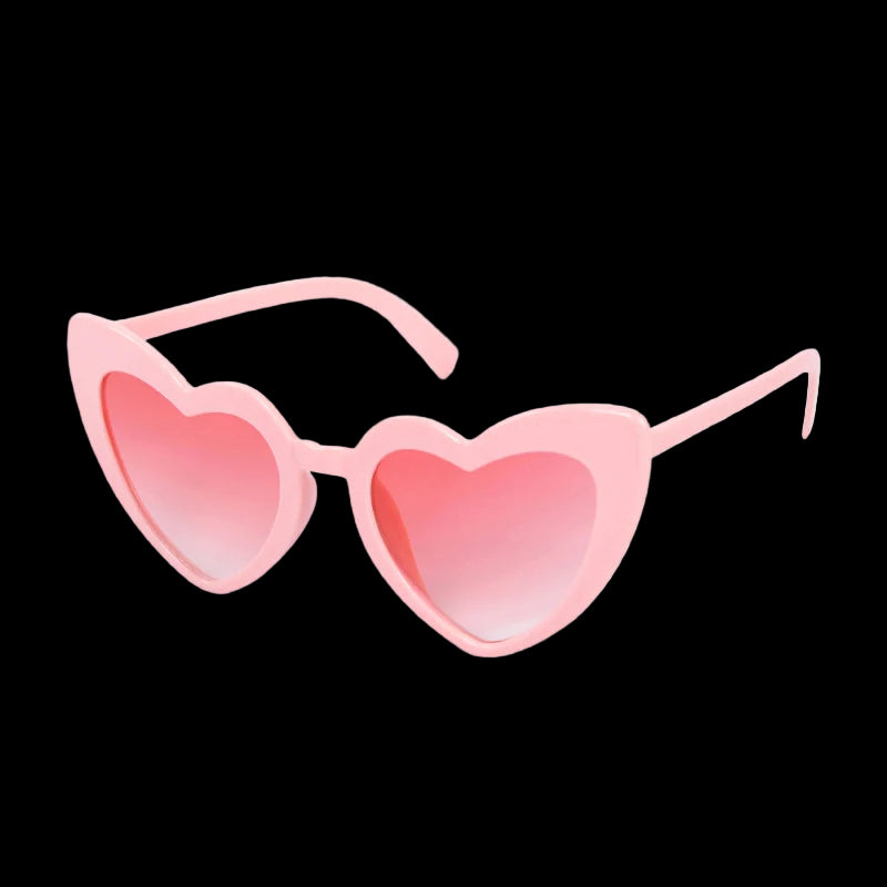 Heart-shaped pink sunglasses on a white background