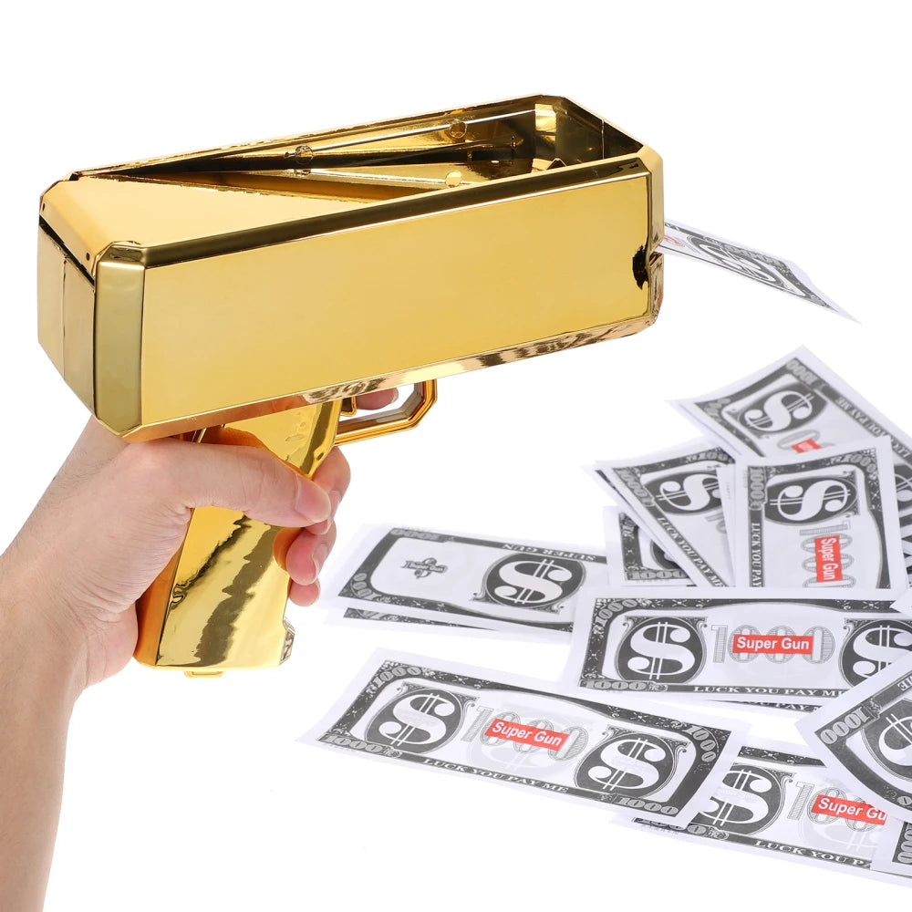 Gold toy gun with money-like sheets on a white background