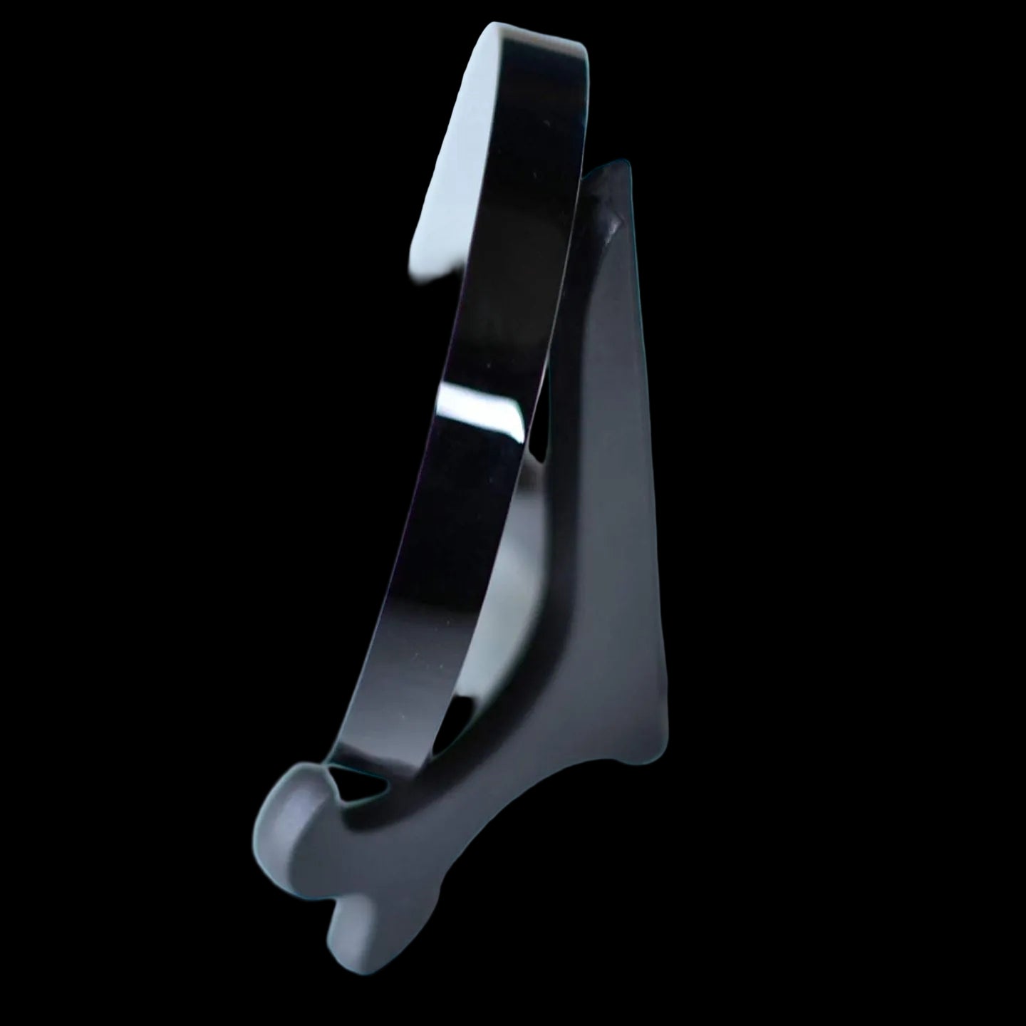 Black metal clip on a white background