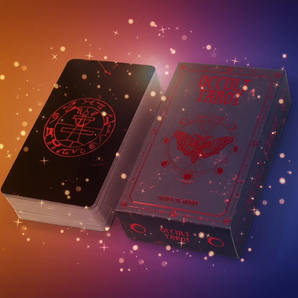 Occult Tarot cards with red symbols on black cardstock against a white background