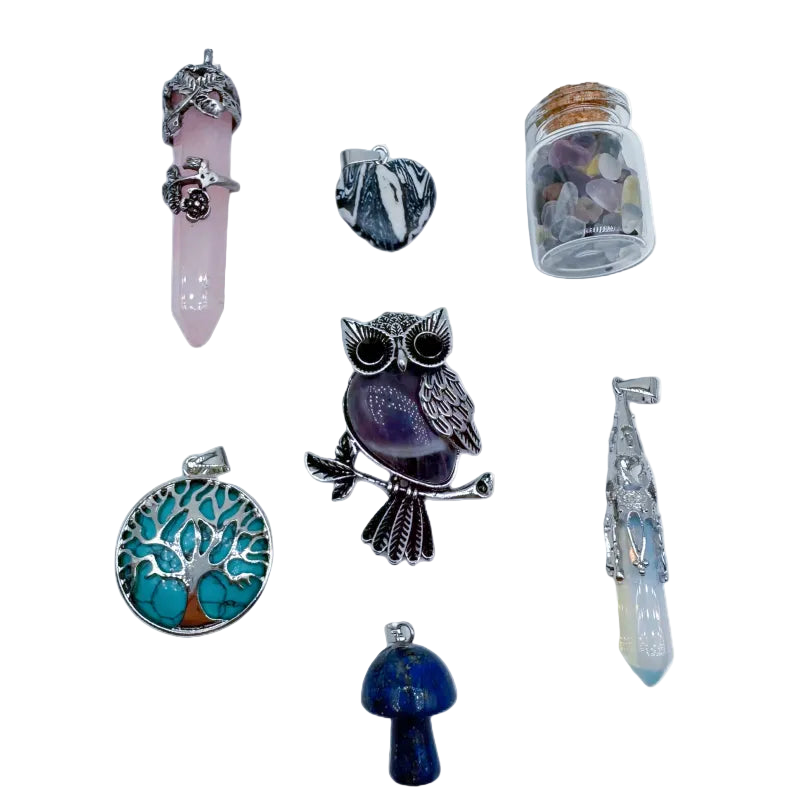 Collection of various decorative pendants on a white background