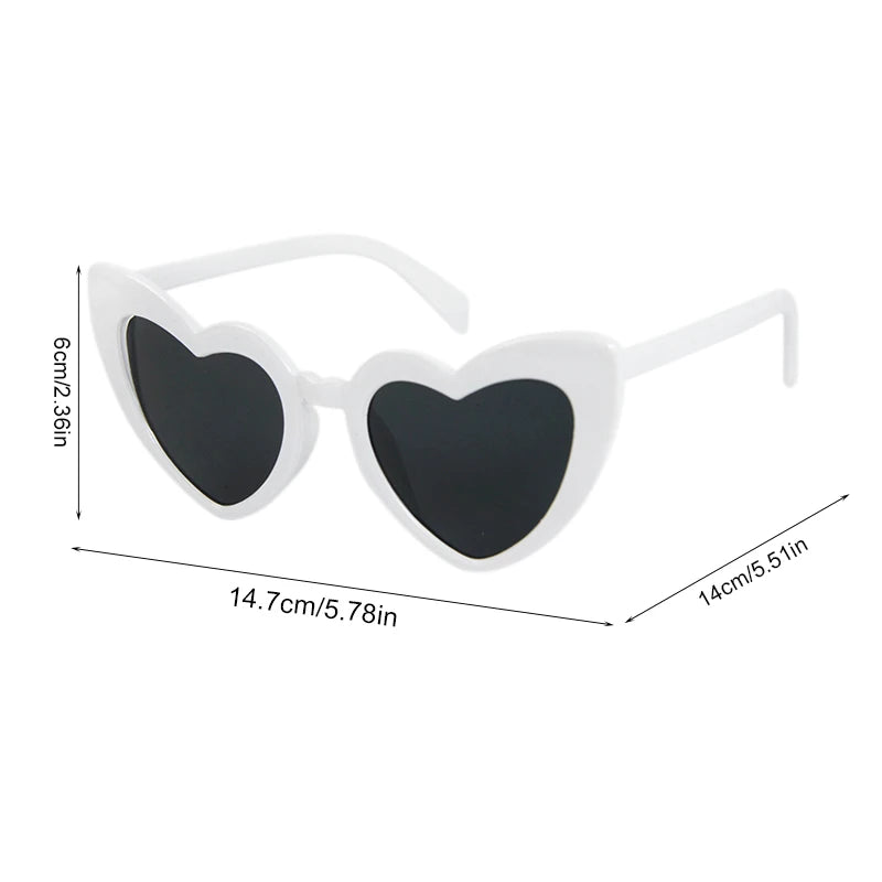 Heart-shaped sunglasses with measurements on a white background