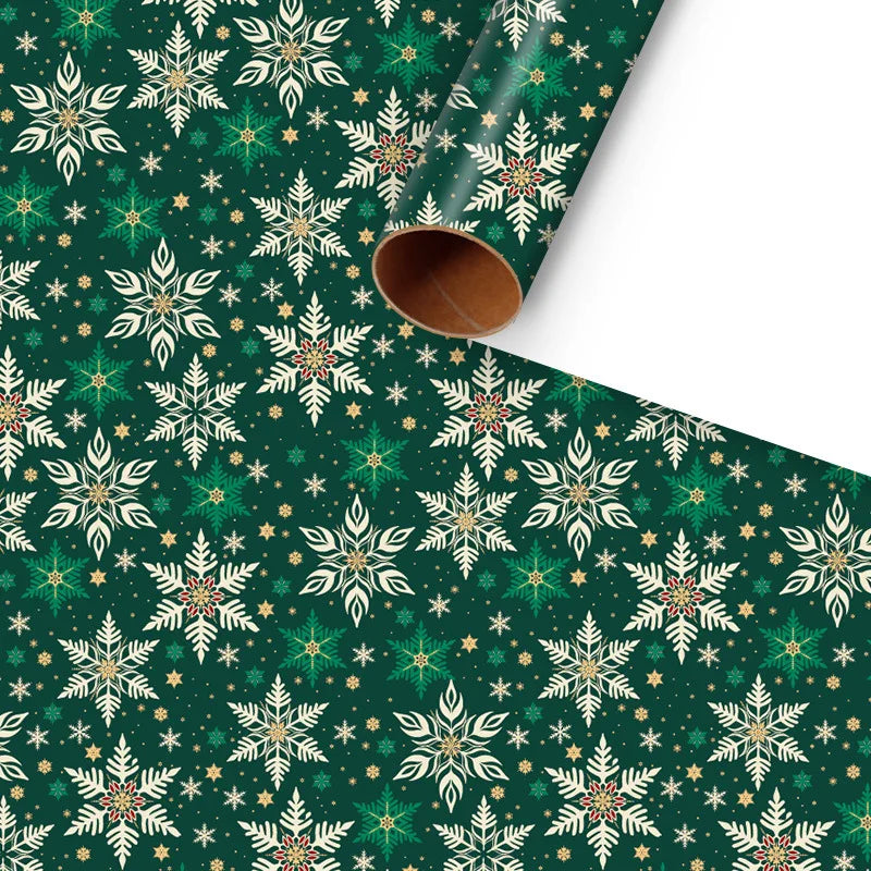 Roll of green wrapping paper with white snowflakes and stars on a green background