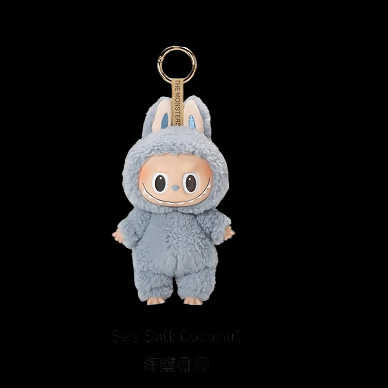Plush keychain in a blue costume with bunny ears on a white background