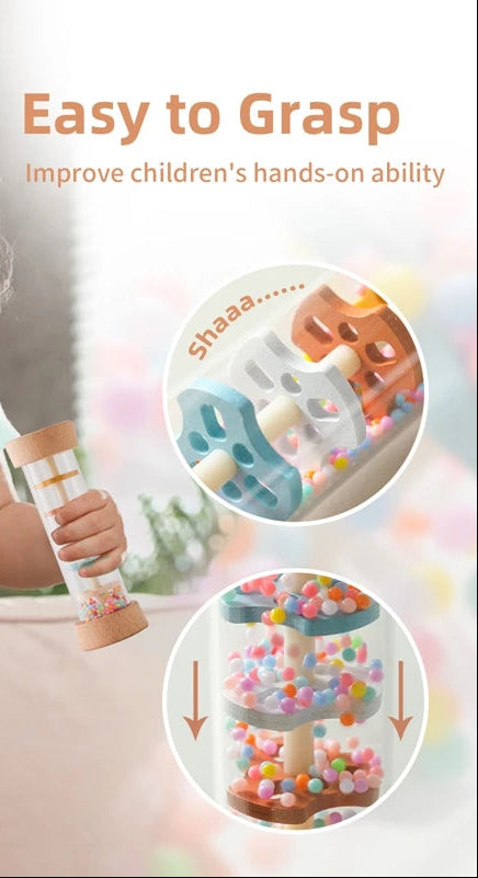 Baby in a light green onesie being held, with a focus on a colorful toy and text about improving children's hands-on ability.