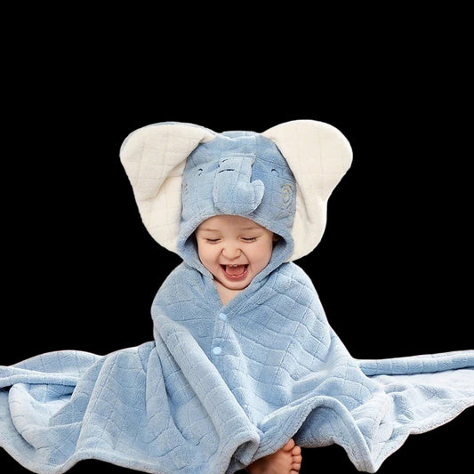 Baby wearing a blue hooded towel with elephant ears, featuring the Aibedila brand.