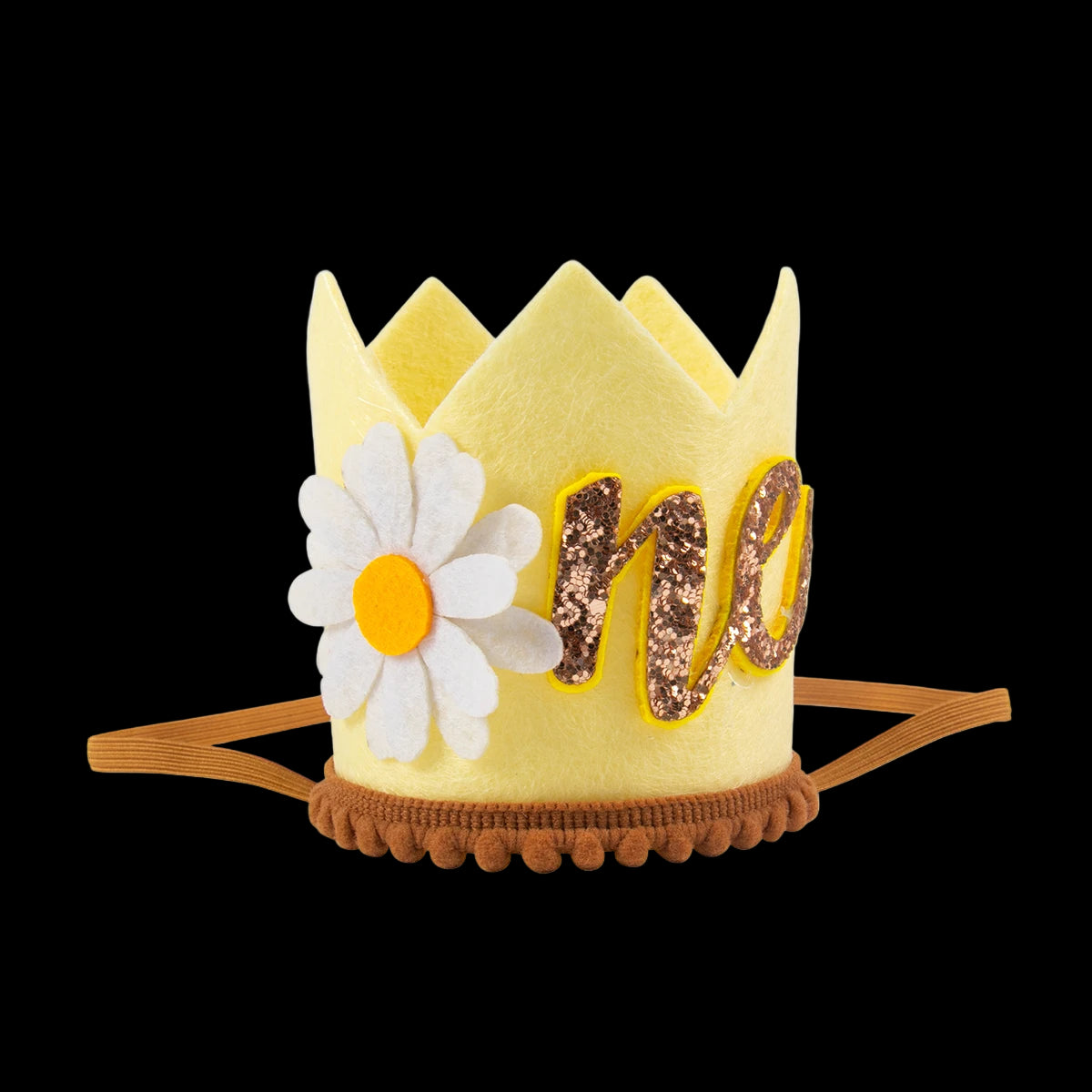 Yellow children's crown with a flower and 'no' lettering on a white background