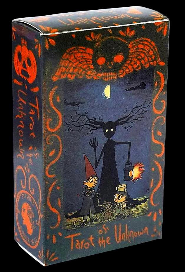 Tarot card box with artistic design featuring a dark figure and mystical elements.