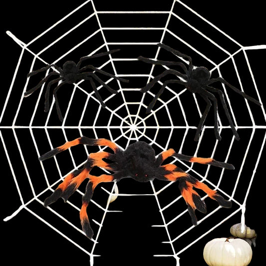 Halloween decorations with large spiders and a spider web in a decorated outdoor setting.