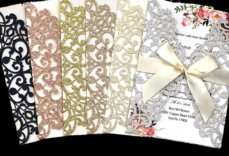 Set of decorative paper strips with floral design on a marble surface