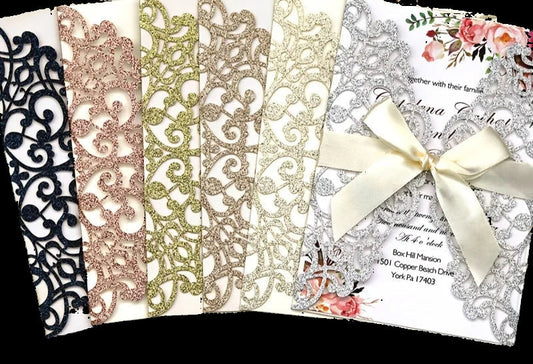 Set of decorative paper strips with floral design on a marble surface