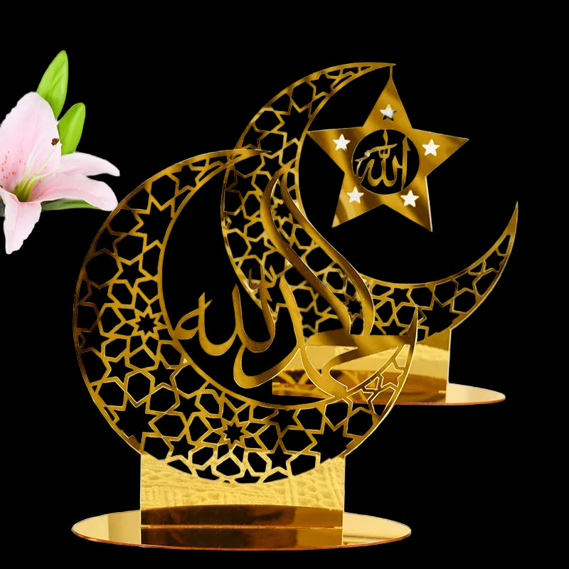 Decorative gold metal crescent moon and star with Arabic calligraphy on a white background