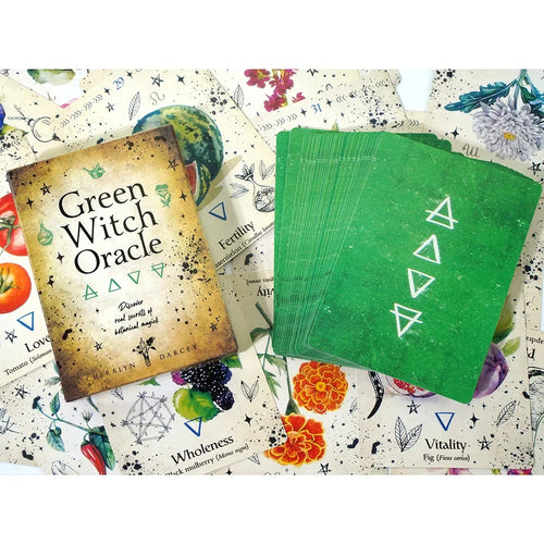 Green Witch Oracle cards with a book titled 'Green Witch Oracle' on a colorful card background.