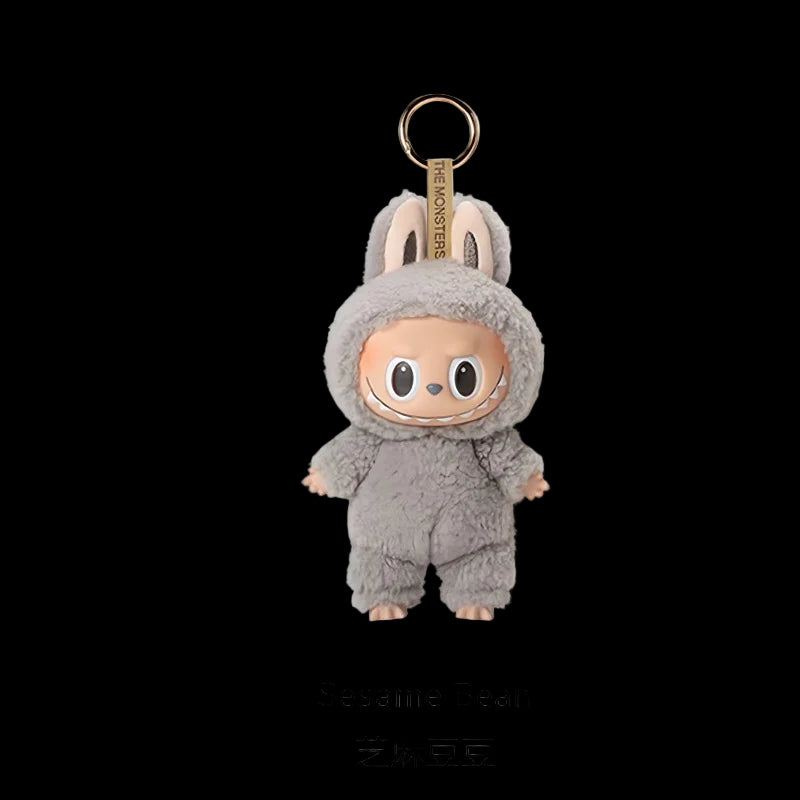 Plush keychain in a gray costume with a brand logo on a white background