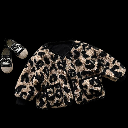 Leopard print jacket and black sneakers on a white background
