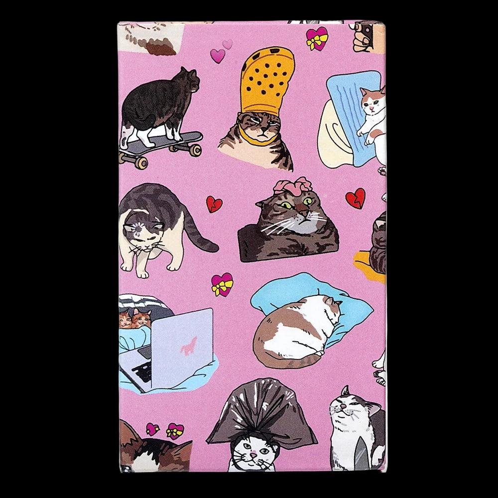 Notebook with cat illustrations on a pink background