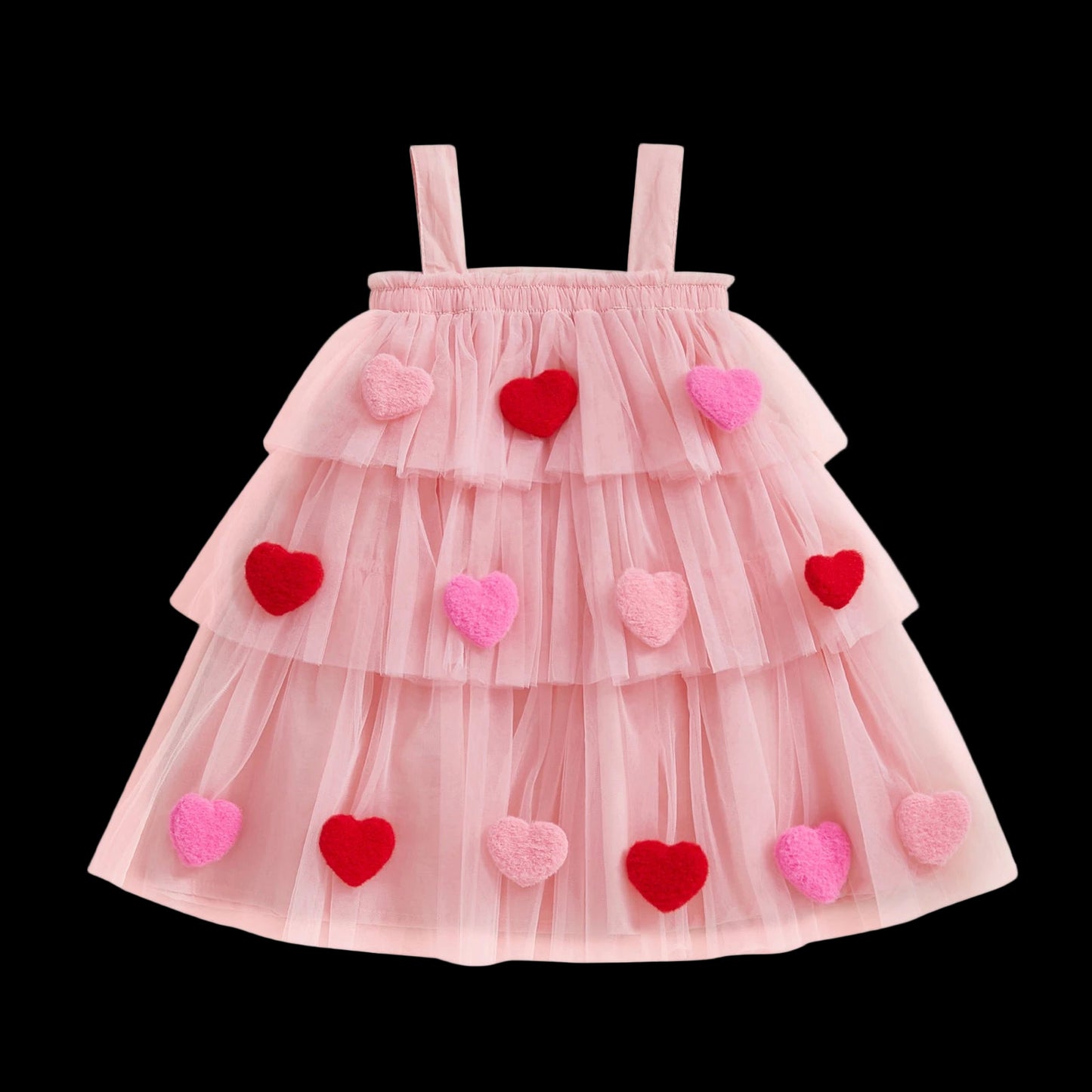 Pink tiered dress with heart decorations on a white background