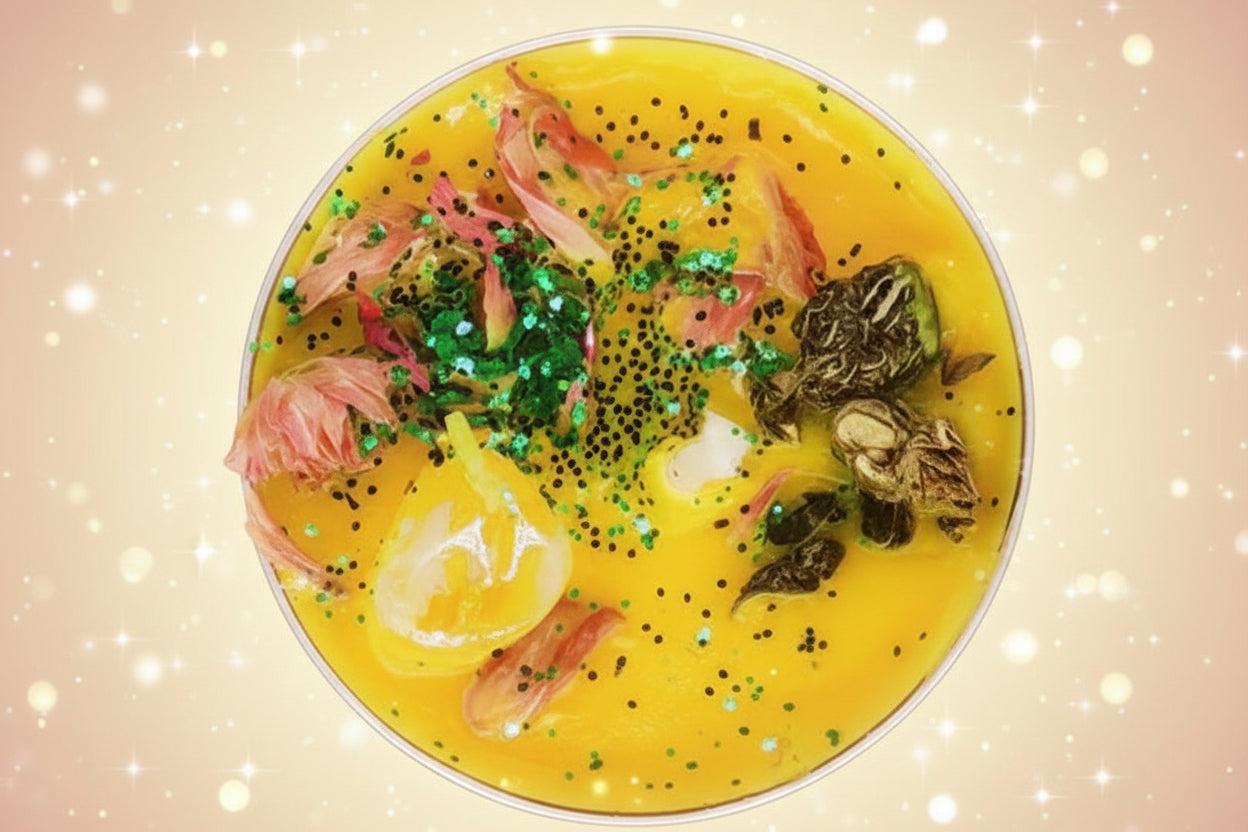 Yellow dish with seafood and vegetables on a pink background