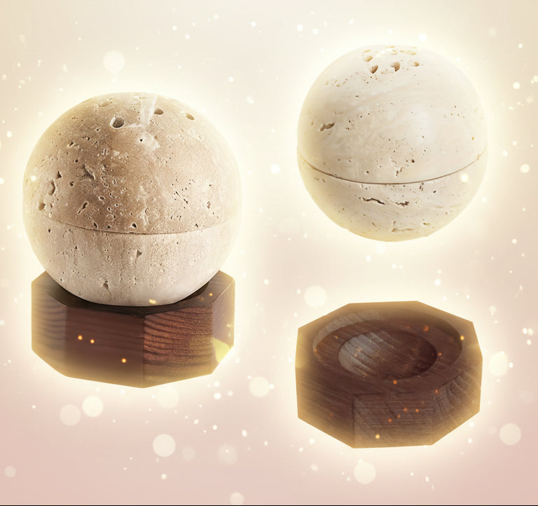 Two stone spheres on wooden stands against a white background