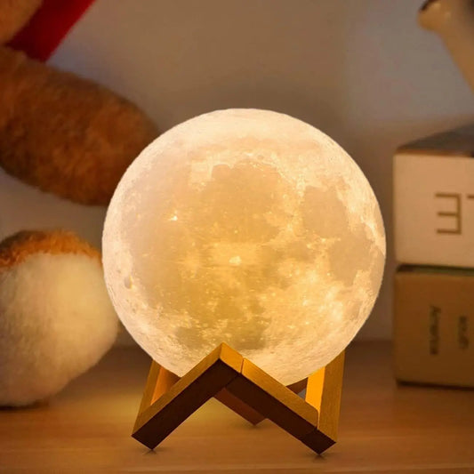 Moon lamp on a wooden stand with a soft focus background