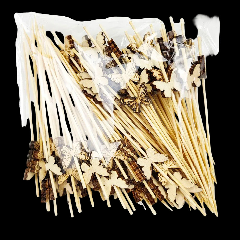 Packaged wooden skewers with butterfly decorations on a white background