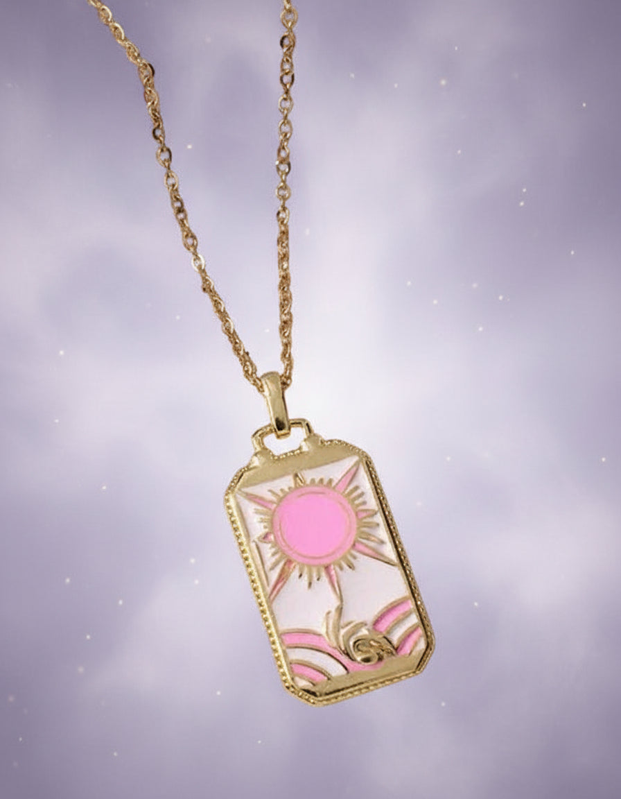 Necklace with a decorative pendant on a textured surface