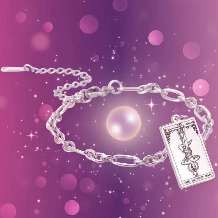 Silver bracelet with a tarot card charm on a white background