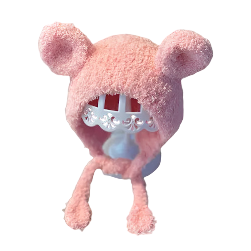 Pink fuzzy hat with ears on a white background