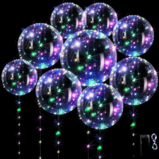 Clear balloons with LED lights on a black background
