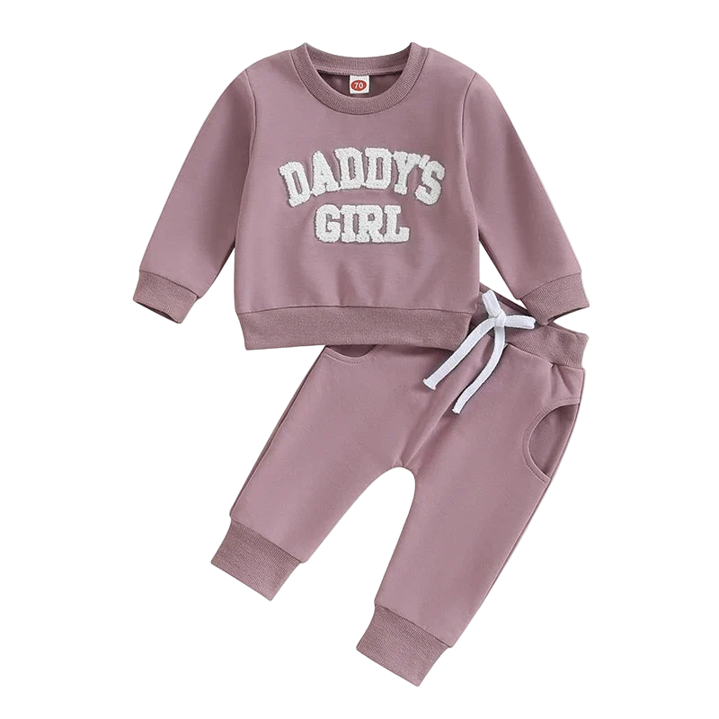 Children's tracksuit with 'Daddy's Girl' text on a white background