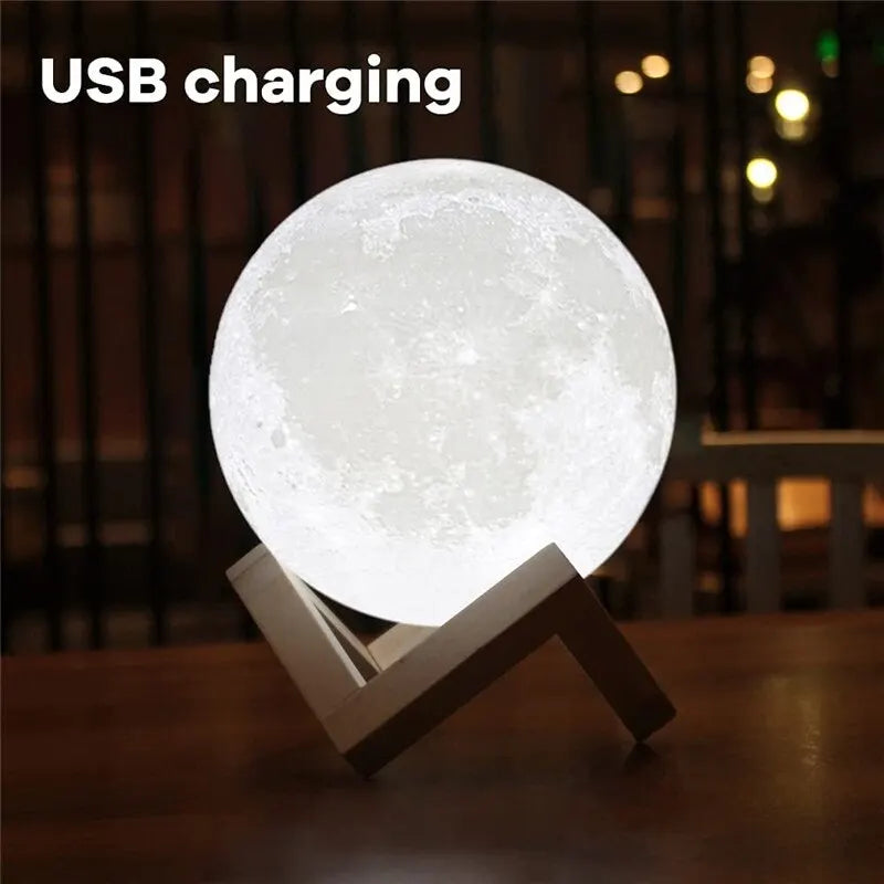 Moon-shaped lamp with USB charging text on a blurred background
