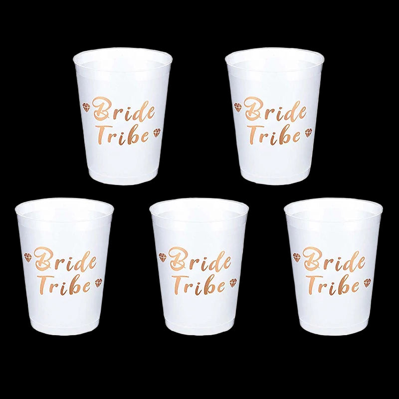 Five white cups with 'Bride Tribe' text in gold on a white background
