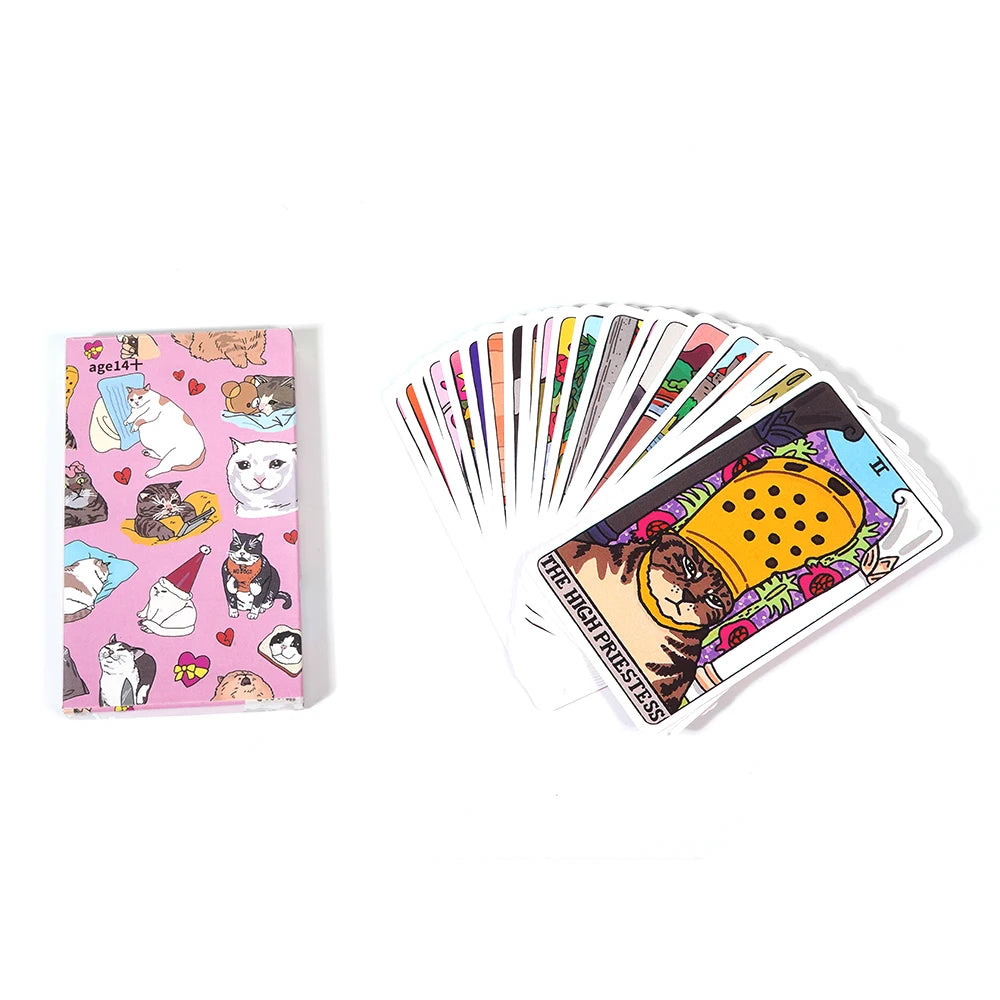 Playing cards with cat illustrations on a pink card holder and deck on a white background